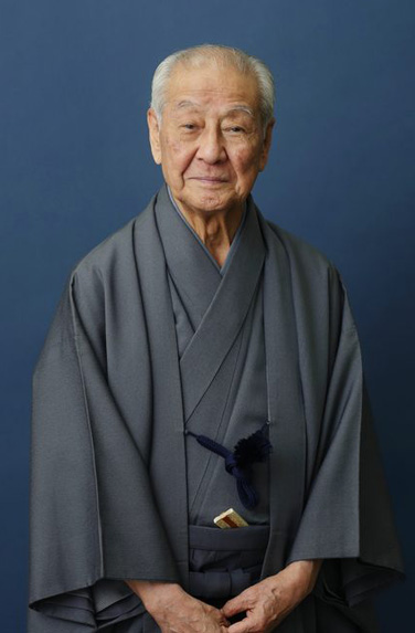 野村萬 会長の顔写真